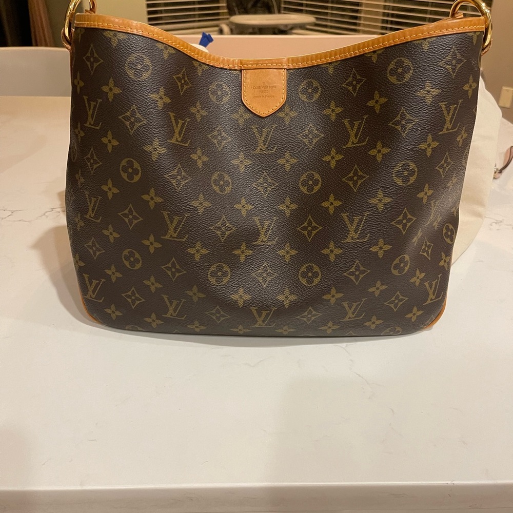 Authentic LOUIS VUITTON delightful MM in very good condition.